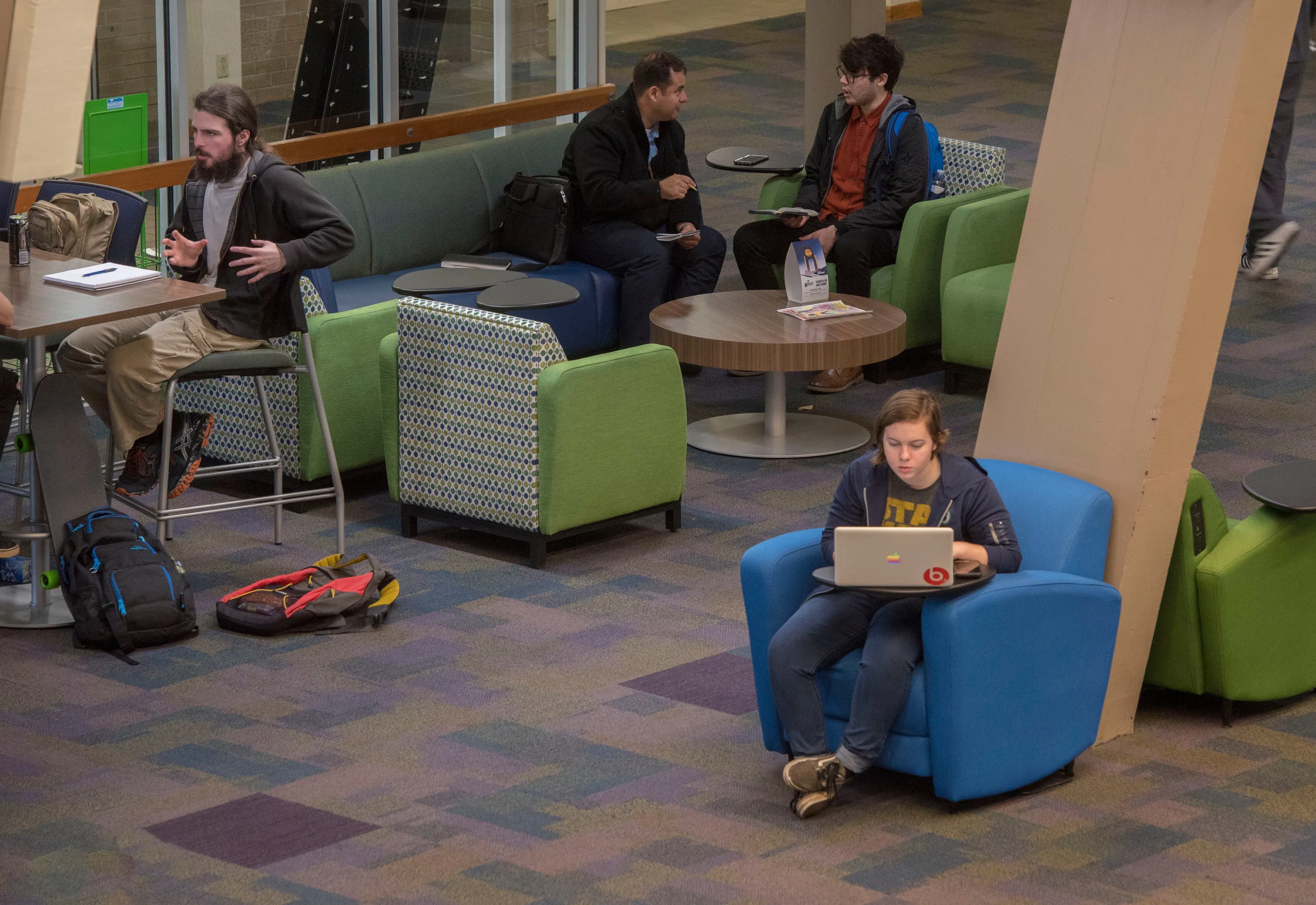 Students in the Great Hall in the University Commons at the University of West Florida.