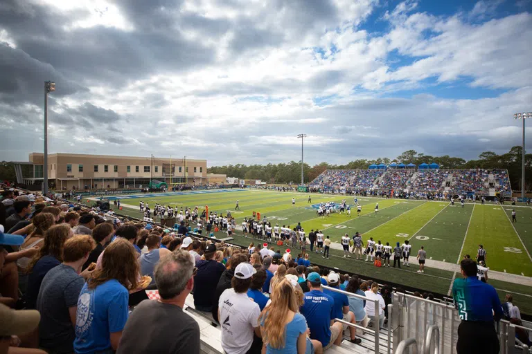 Fans watching football at UWF PenAir Field