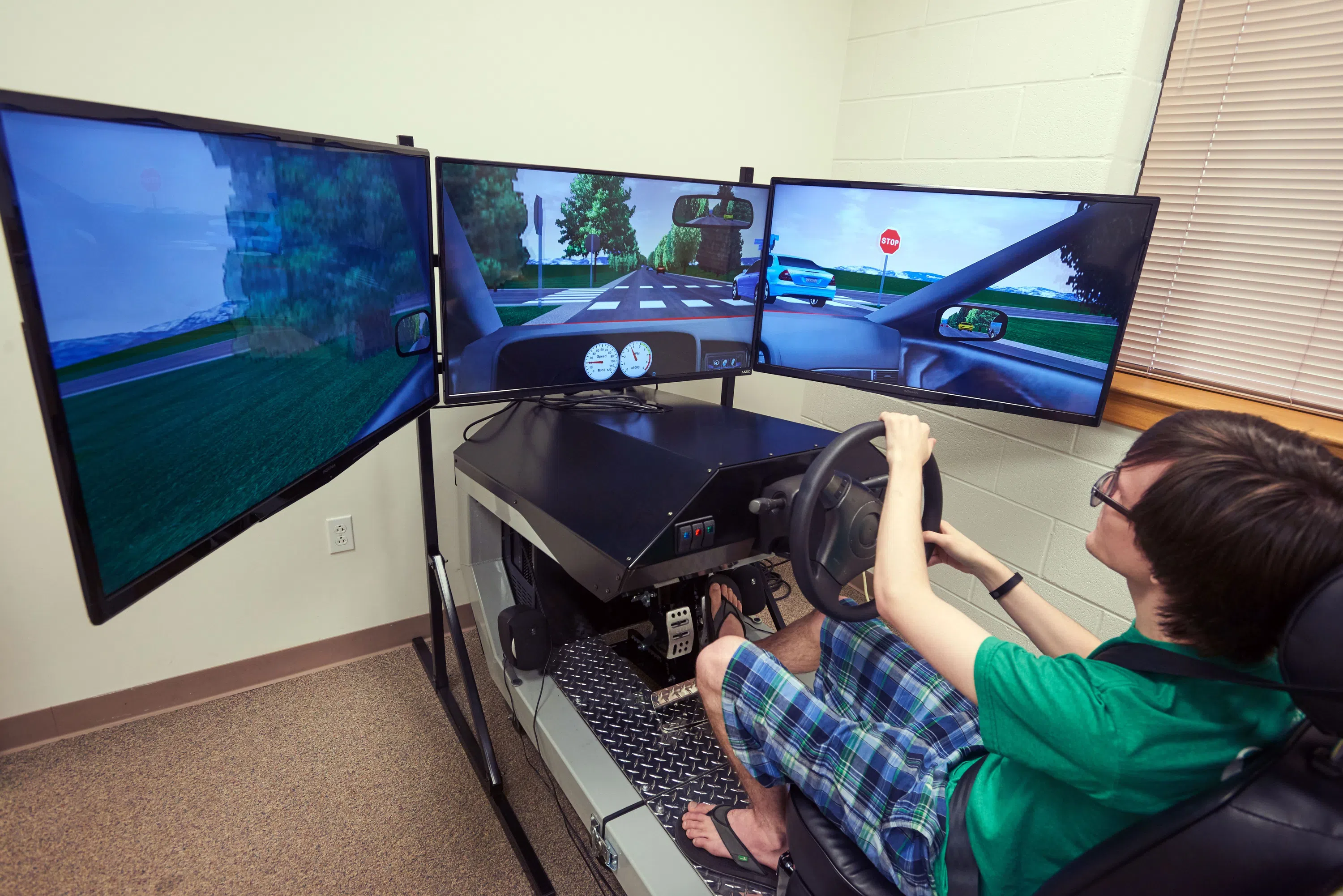 Student takes a spin in the Driving Simulator 