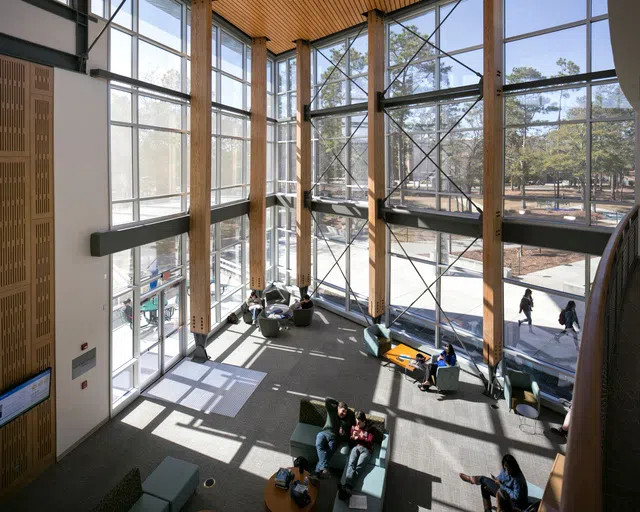 A upper floor view looking down on the atrium in the Lewis Bear Jr. College of Business. 