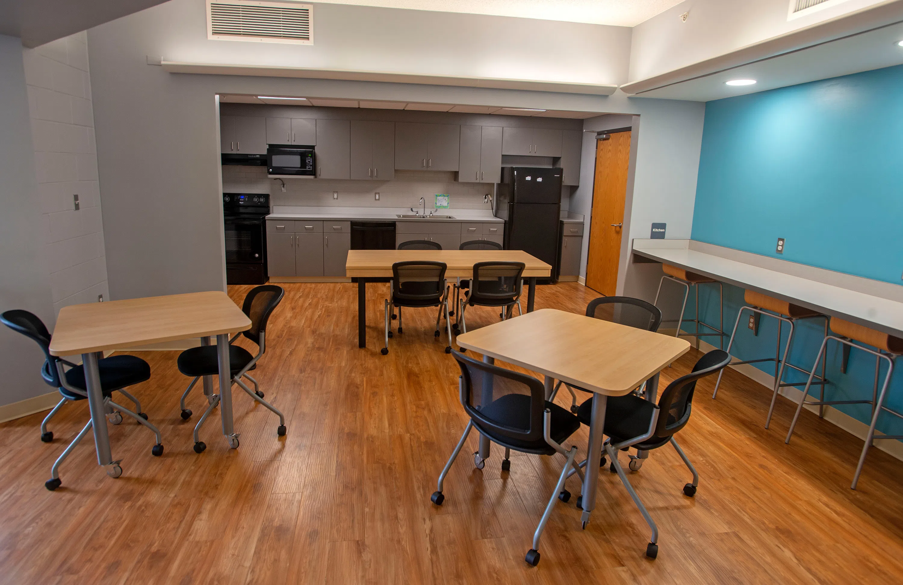 Tables and chairs in the Martin Hall kitchen and lounge.