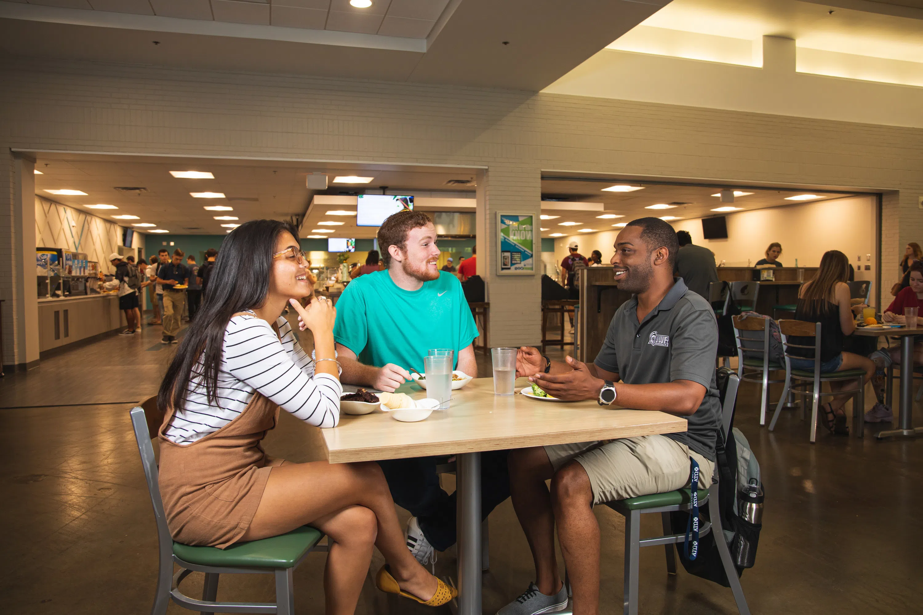 UWF students enjoying lunch in the Nautilus Market in the University Commons. 