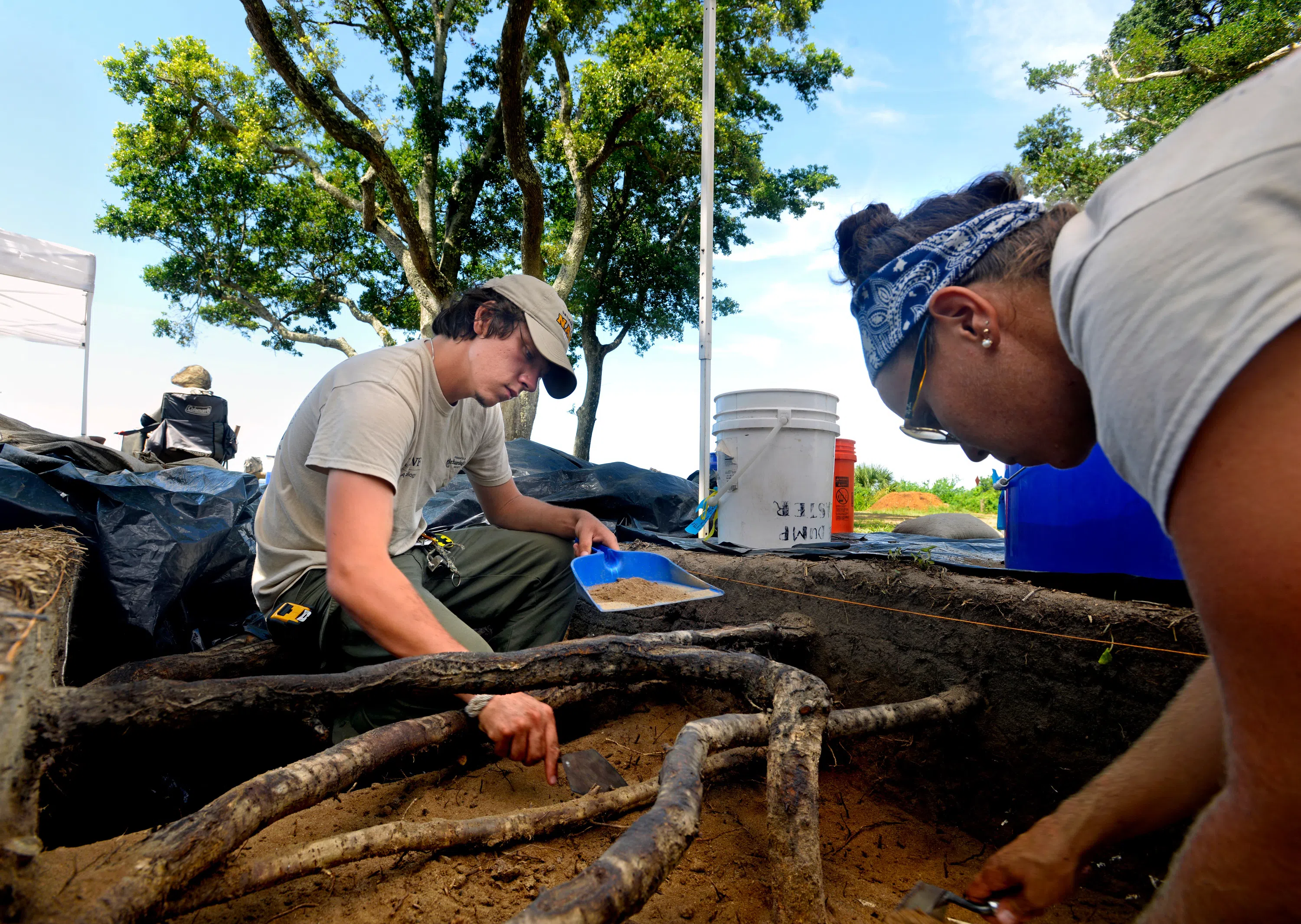Students cleaning artifacts at the Luna excavation site in downtown Pensacola