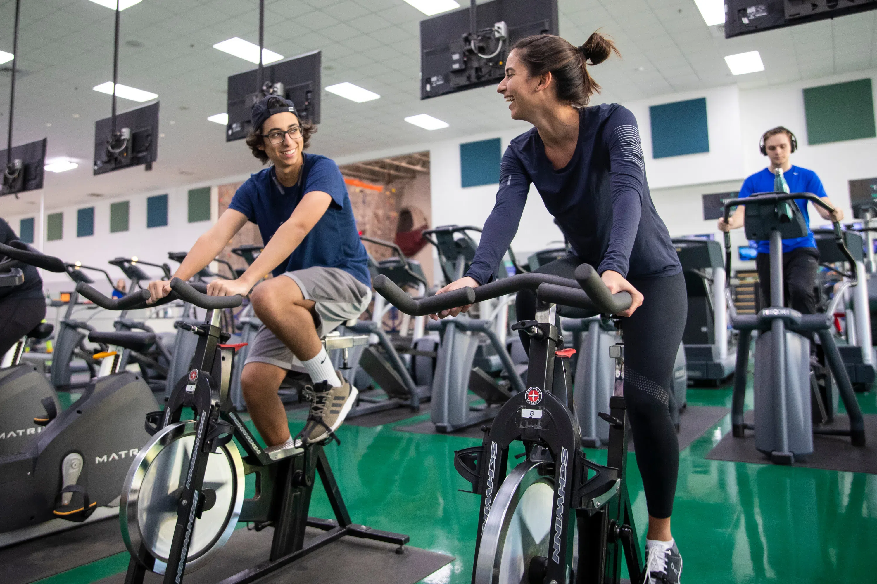 UWF students using exercise bikes in the HLS Facility. 