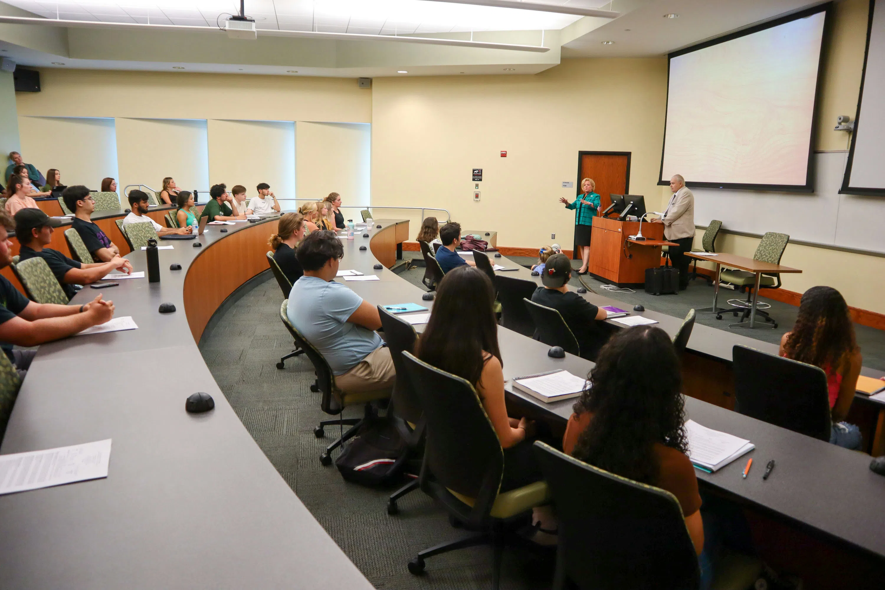 Students attending a lecture at the Muma College of Business