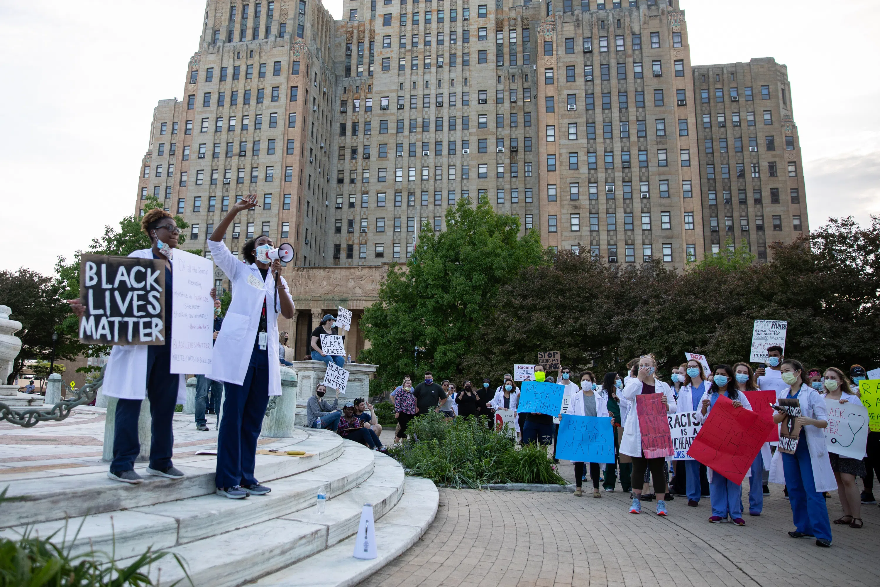 Faculty, students and others from the Jacobs School of Medicine and Biomedical Sciences took part in a "White Coats 4 Black Lives" march.