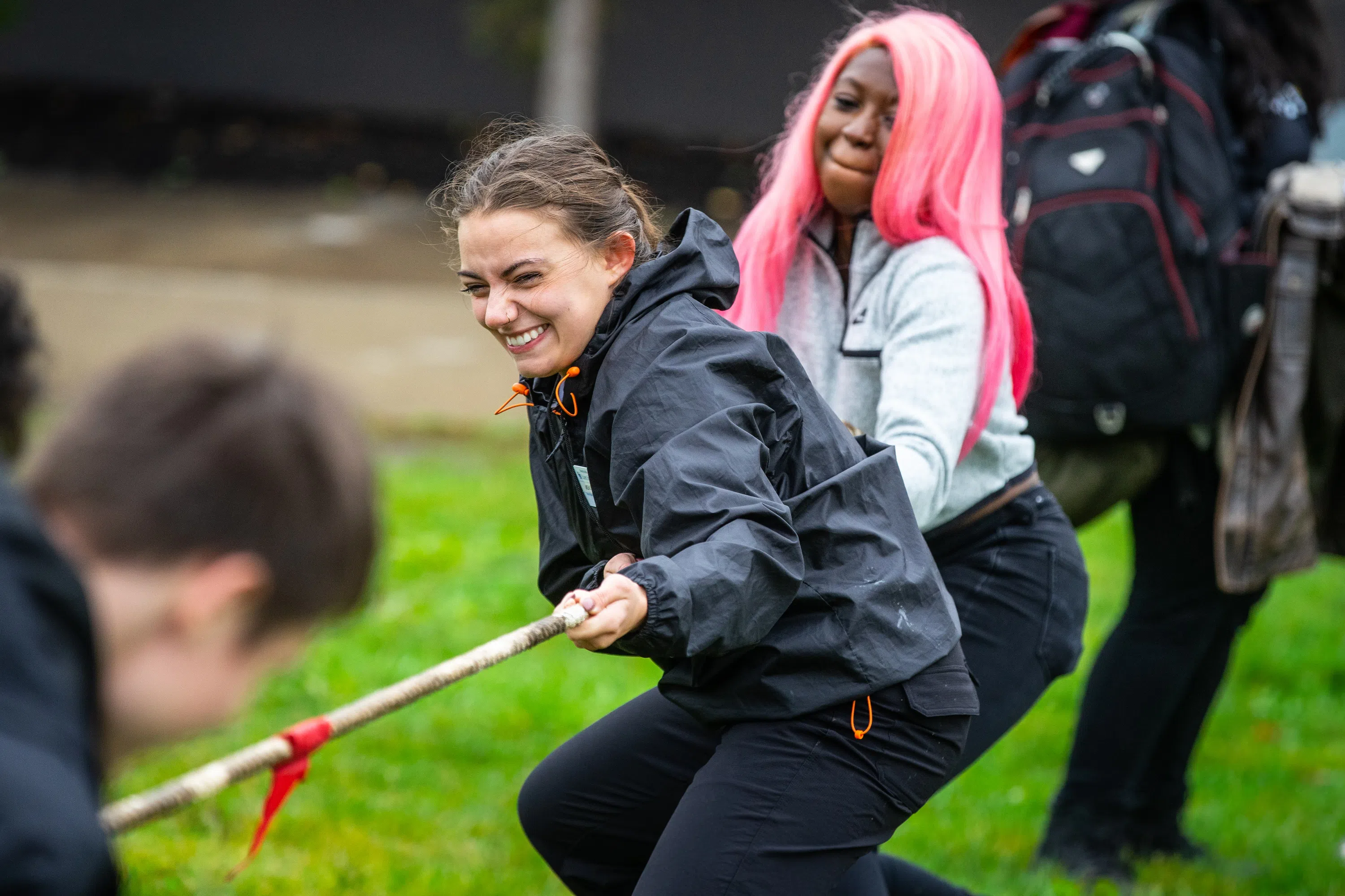 Students participate in tug of war, part of Club Olympics, an event hosted by the Student Association (SA).