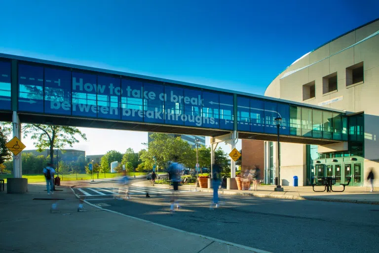 Exterior of Student Union with students walking by