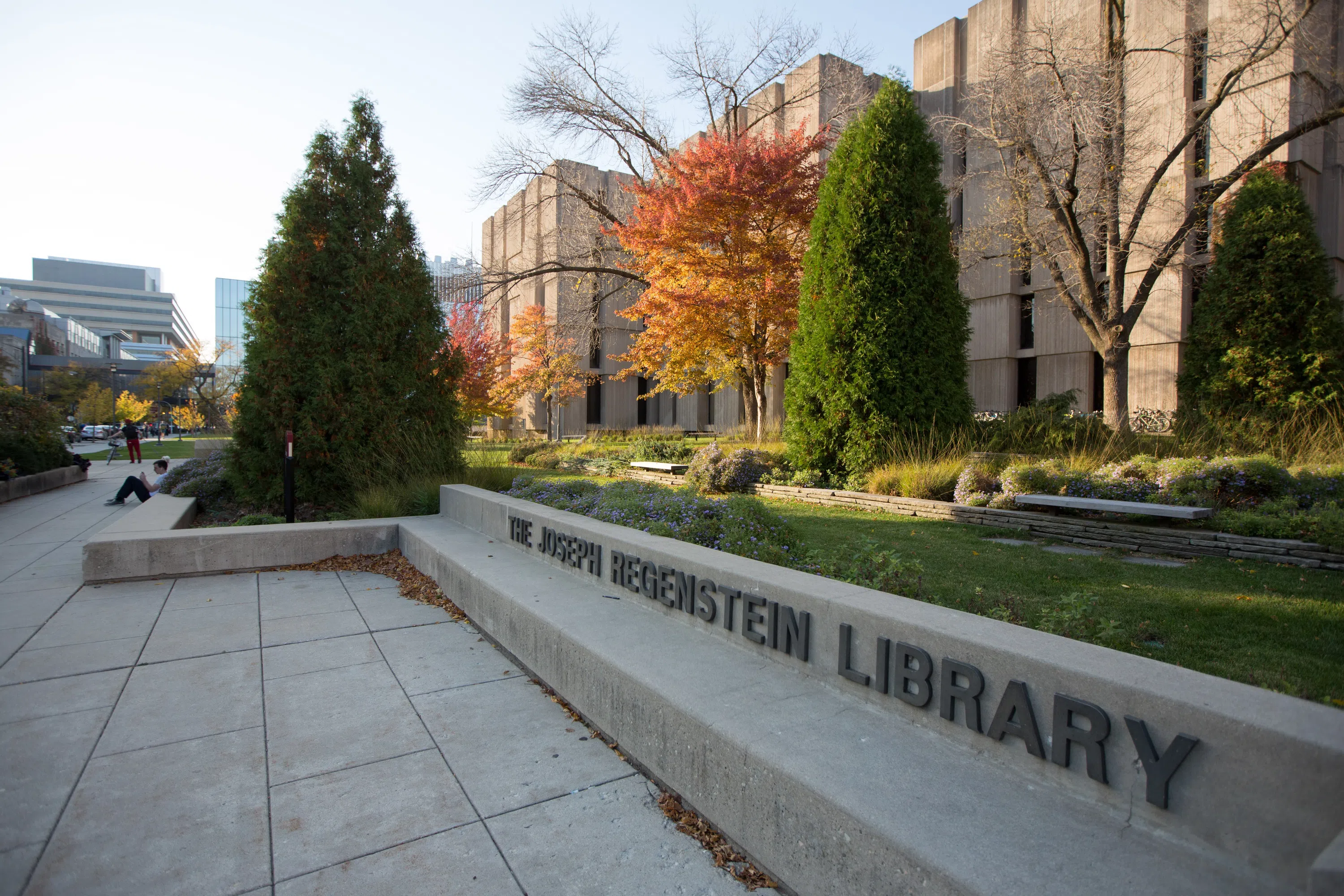a sign in front of a building reading "The Joseph Regenstein Library"