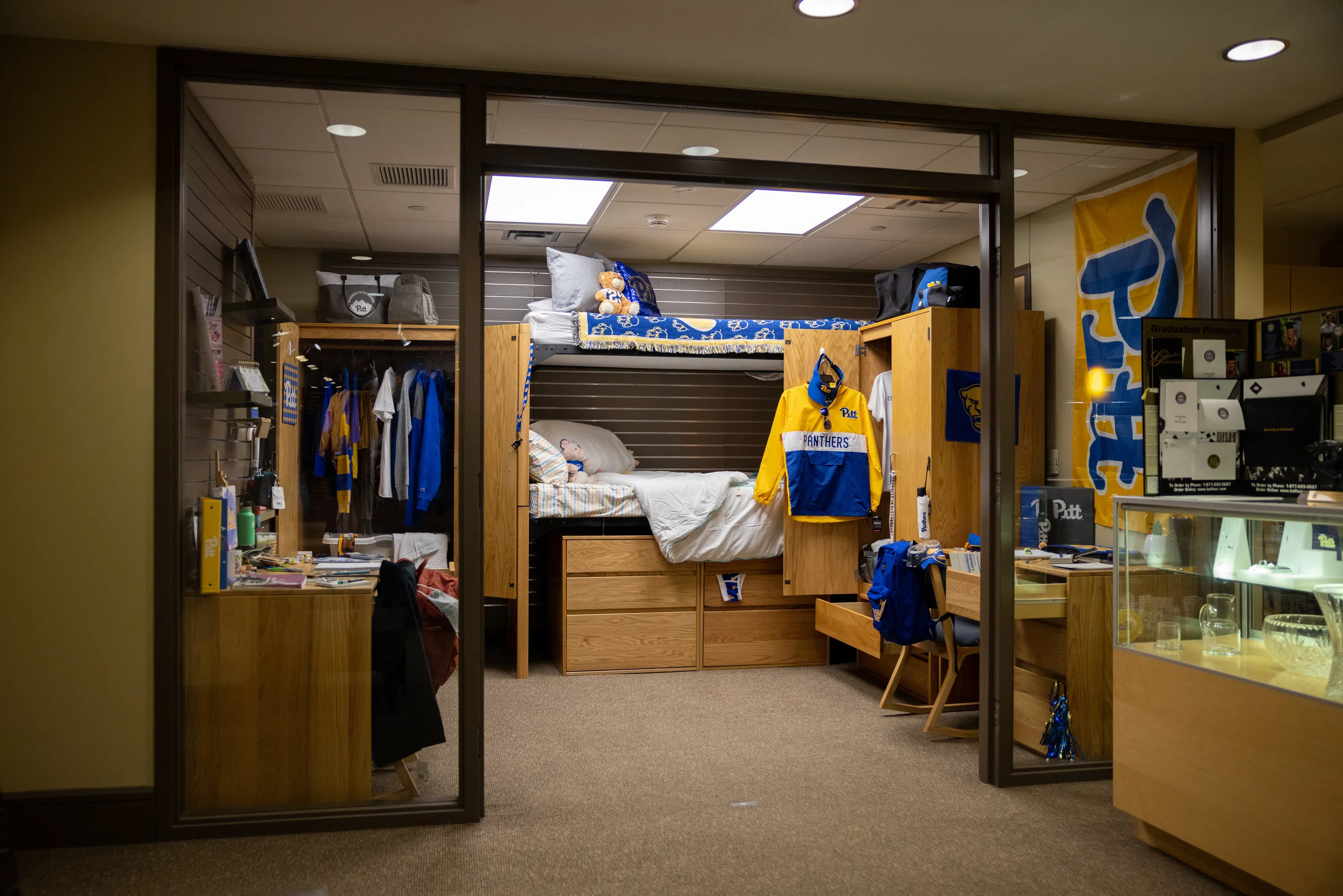 Mock residence hall room found in the University Store