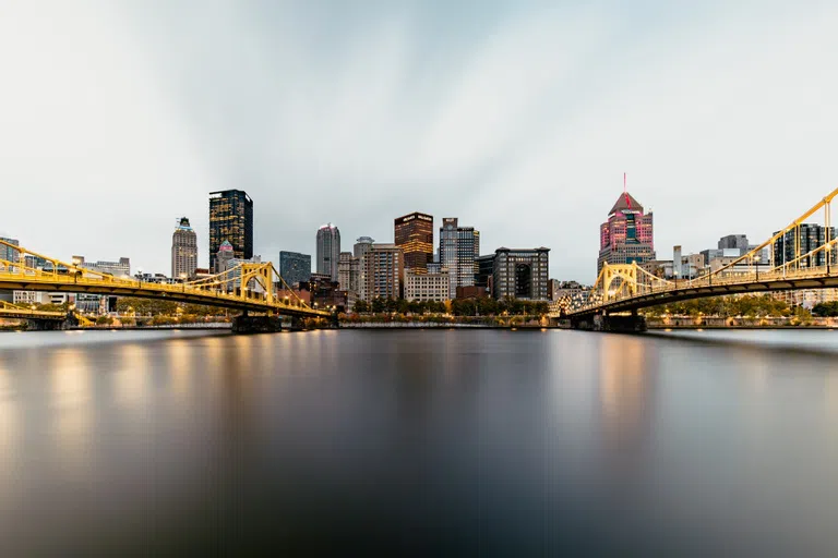 View of downtown Pittsburgh from the North Shore, flanked by two of the city's iconic gold bridges