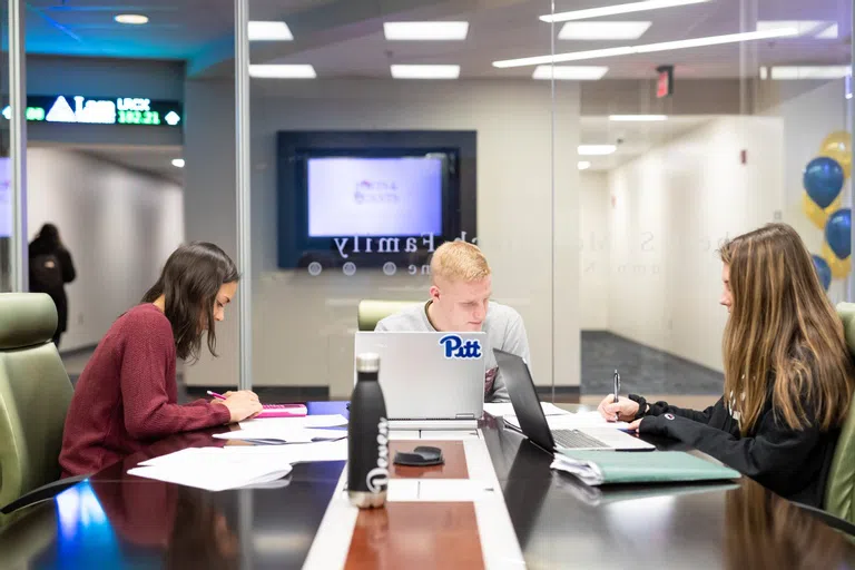 Students collaborating on project in College of Business Administration