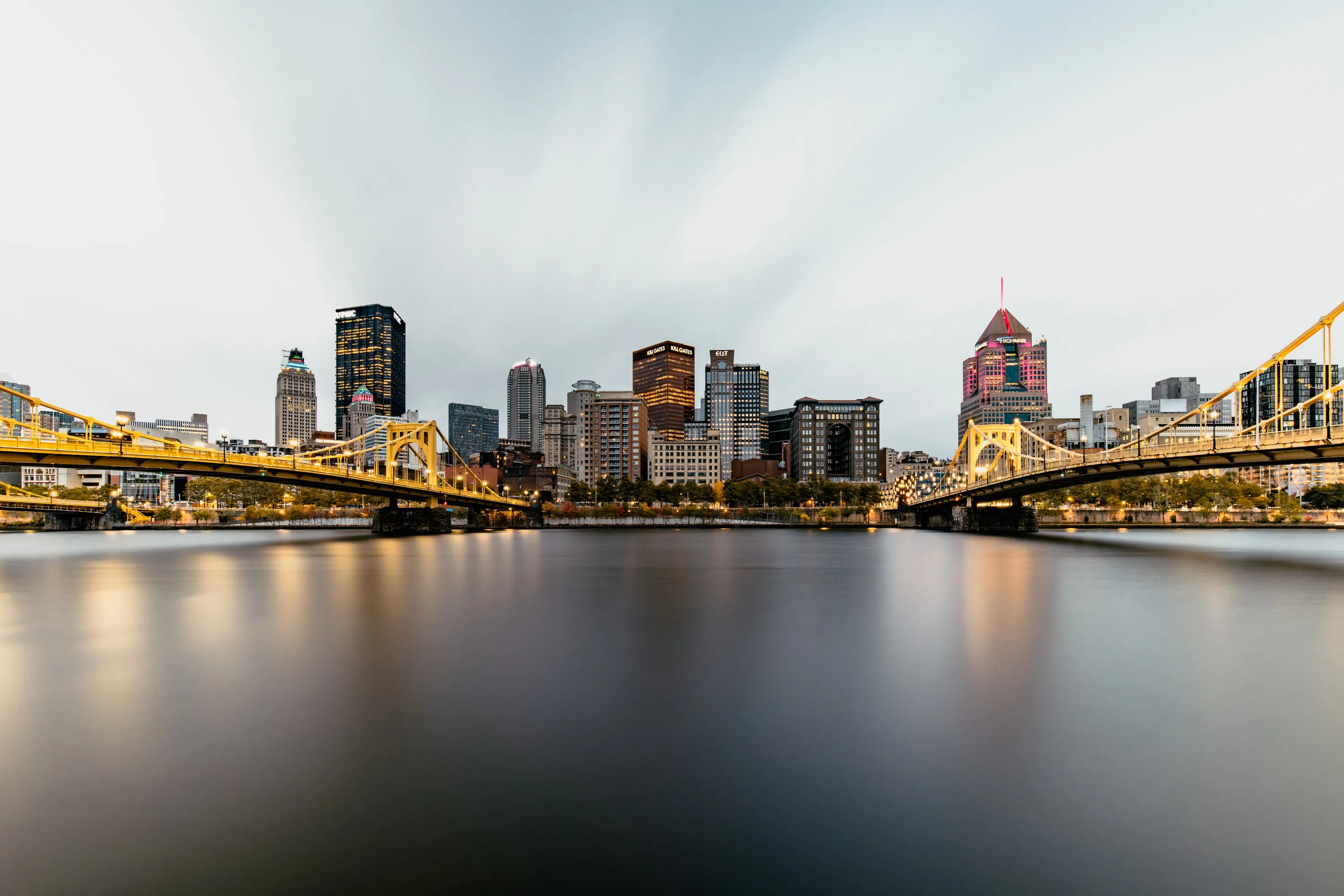 View of downtown Pittsburgh from the North Shore, flanked by two of the city's iconic gold bridges