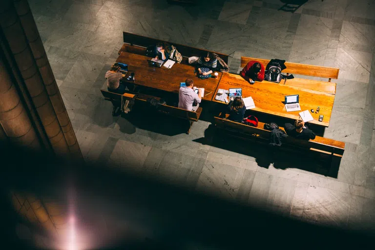 Overhead photo of students studying in the Commons Room