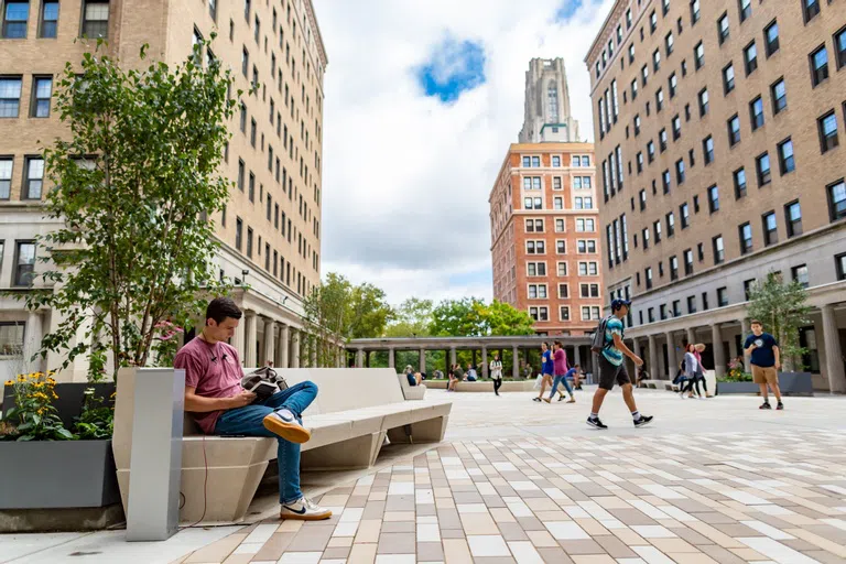 Student studying on Schenley Quad Patio