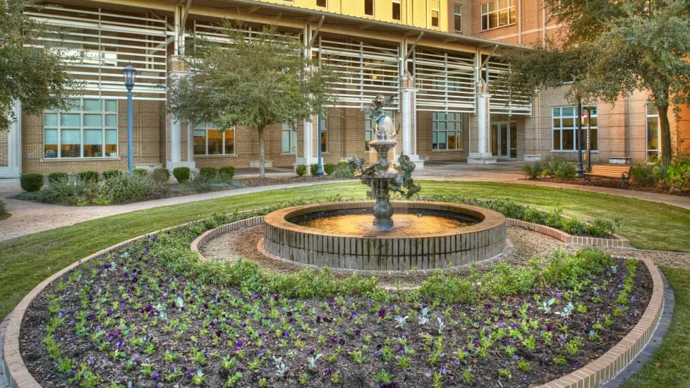 View of the fountain in the Public Health Research Center courtyard during the day