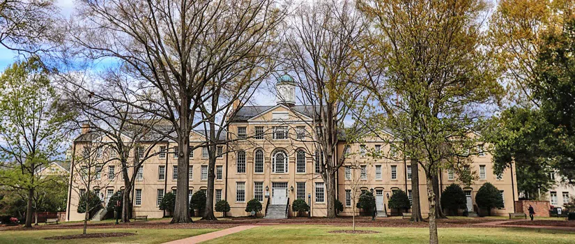 View of the front of DeSaussure College during the day.