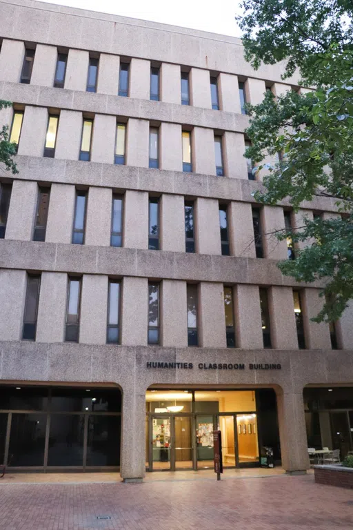 View of the front of the Humanities Classroom Building during the day