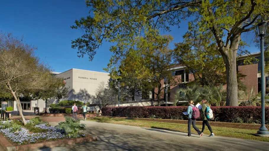 Students walking towards the Russell House University Union.