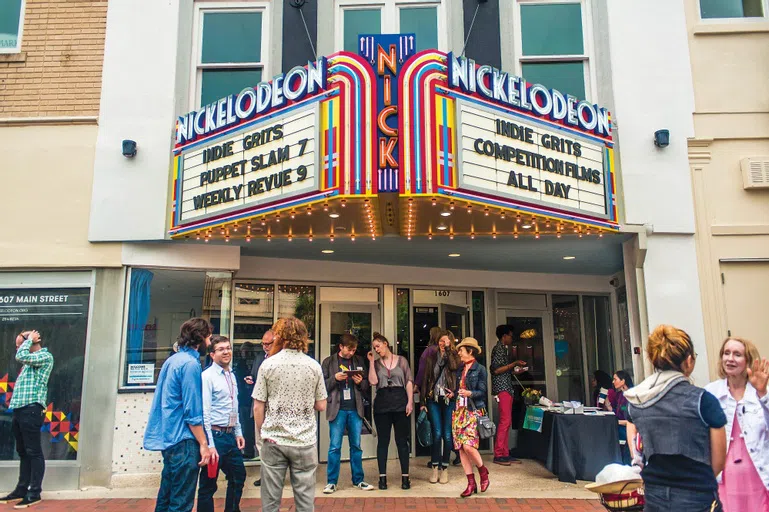 People milling around outside of the Nick