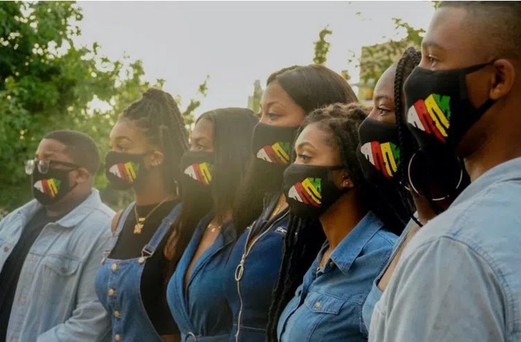 Students lined up in AAAS masks