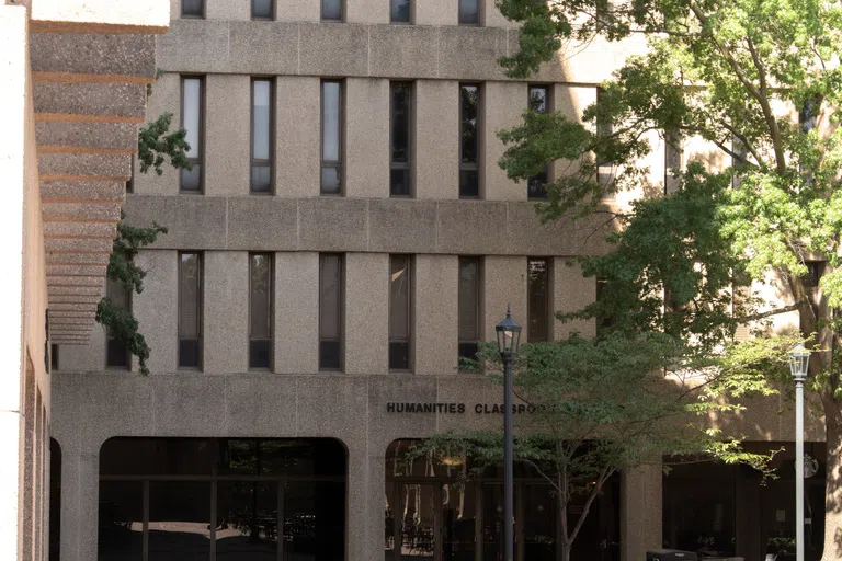 View of the front of the Humanities Classroom Building during the day