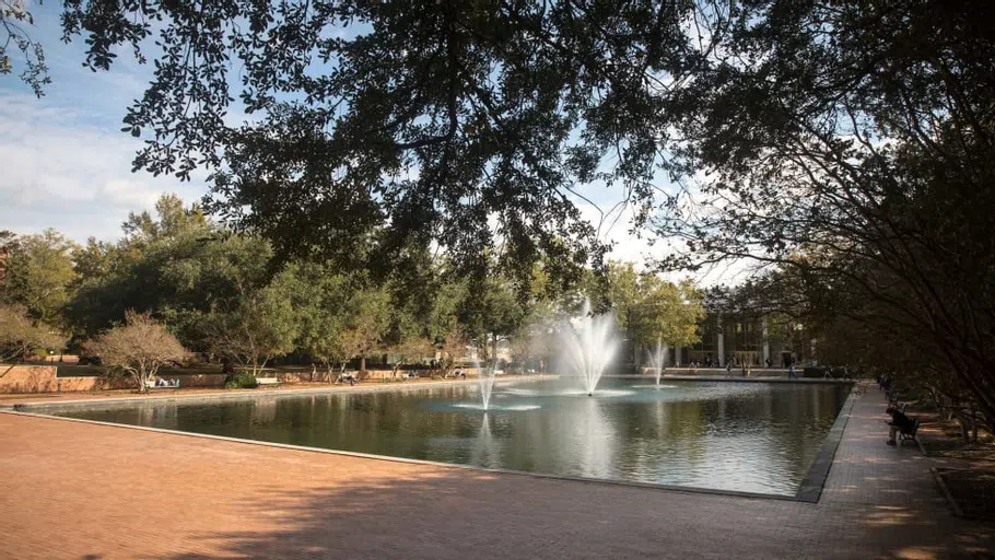 The reflecting pool and fountains during the day