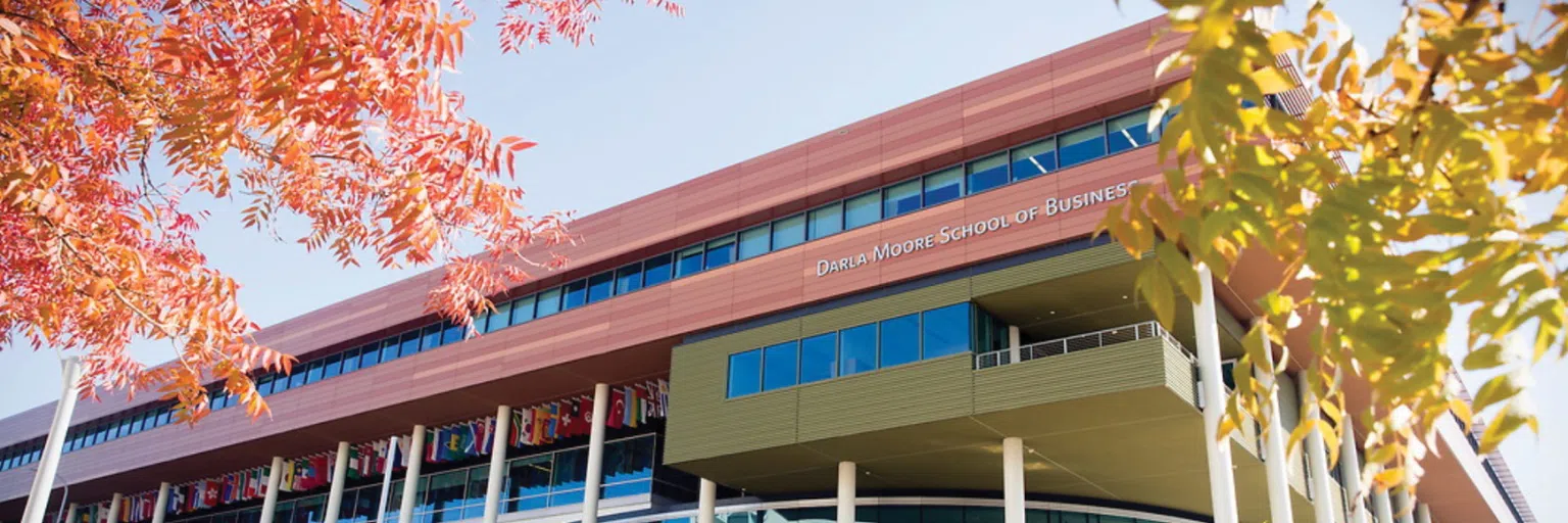 View of the front of the Darla Moore School of Business during the day