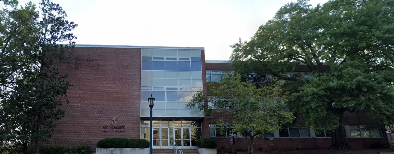 View of the front of the Callcott Social Sciences Building during the day