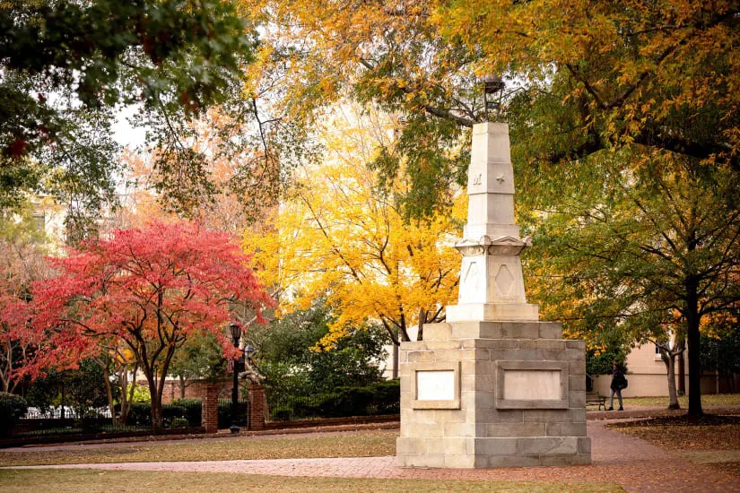 Maxcy Monument with fall foliage in the background