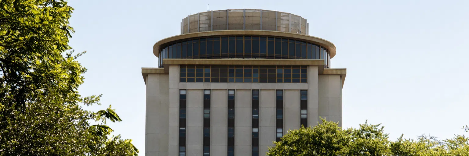 Close-up of the top of Capstone House during the day