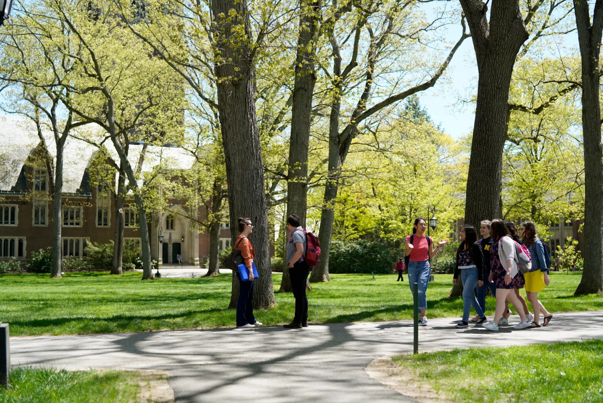 Wellesley students walking to class through Academic Quad