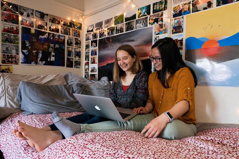 Wellesley students hanging out in their dorm room