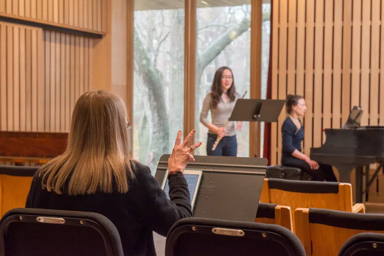 Wellesley music students practicing in the salon 