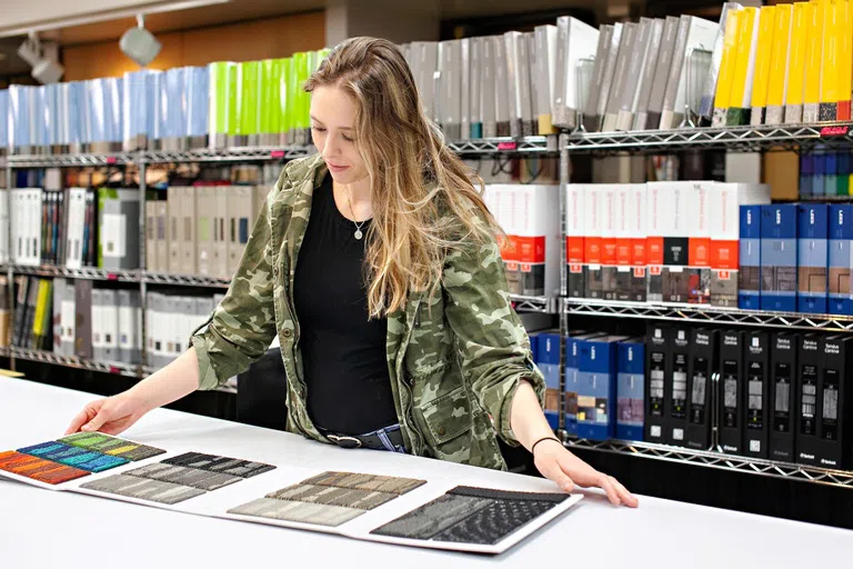 Students in Interior Design at NDSU have access to a resource center filled with current samples and a product library, as well as a studio space they utilize to complete key design projects. 