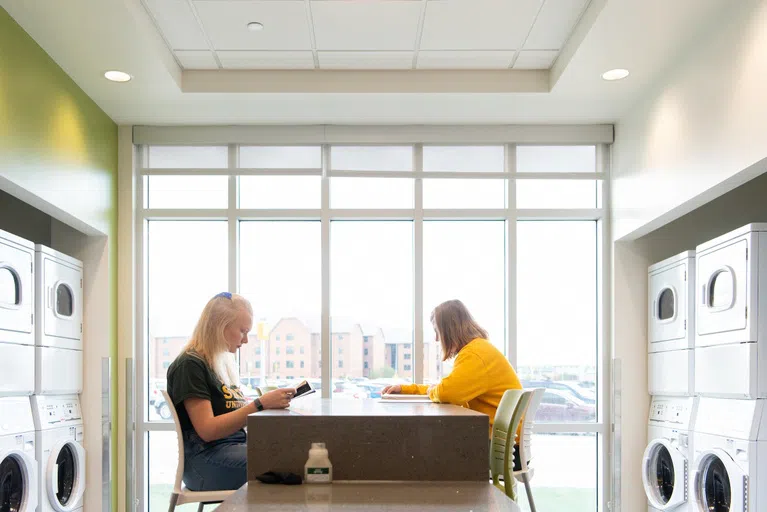 All NDSU Residence Halls at NDSU feature coinless laundry options for students.