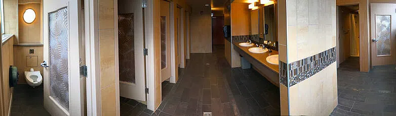 A panoramic view of the community-style bathrooms within Stockbridge Hall.